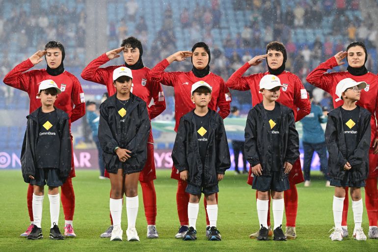 Defiant Chorus: Iranian Women's Football Team Sings National Anthem Amid Escalating War
