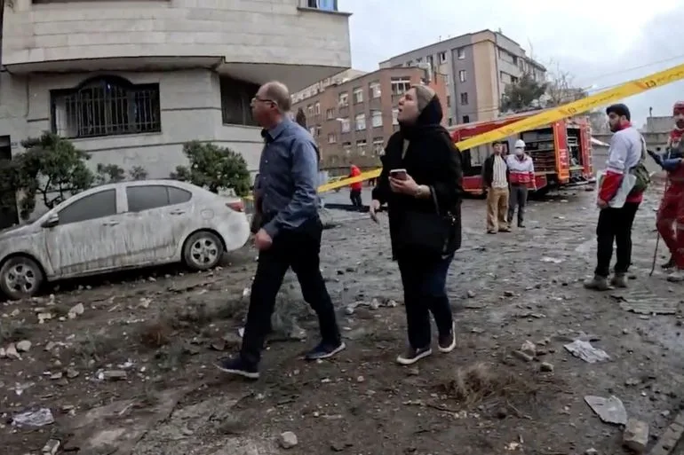 U.S. and Israel Escalate Attacks on Iran's Infrastructure, Sparking War Crimes Concerns and Rising Casualties