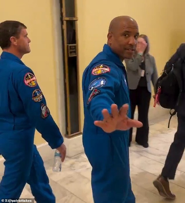 Conspiracy theorist aggressively accuses Artemis II astronauts of faking lunar mission.