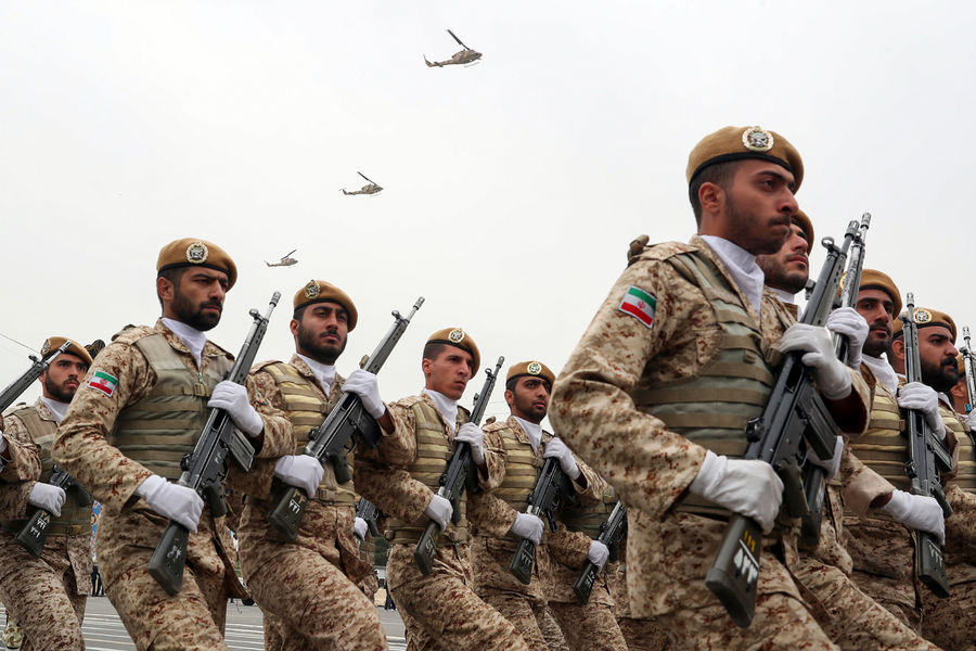 Iran warns it will activate total defense if US violates ceasefire deal.