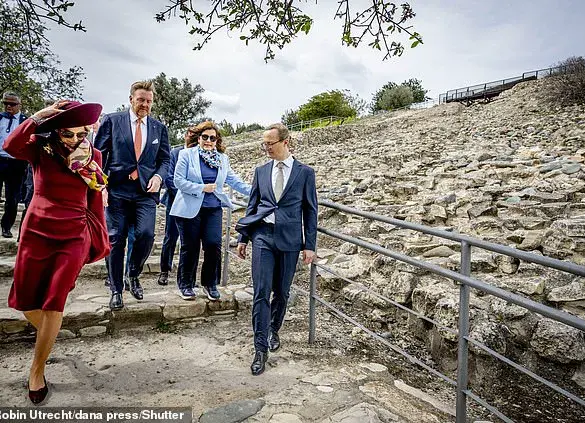 Queen Maxima Dazzles in Burgundy Dress During Royal Visit to Prehistoric Site in Cyprus