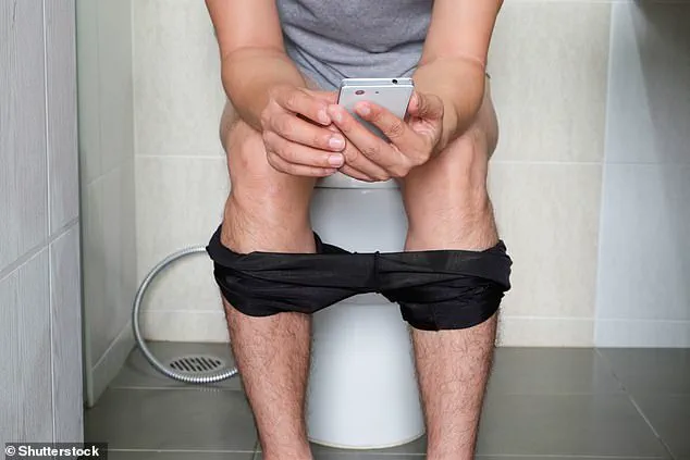 Expert Warns of Bacterial Risks from Bathroom Phone Use