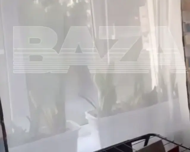 Exclusive Footage from Baza Telegram Reveals Drone Explosion Near Azov Residential Area