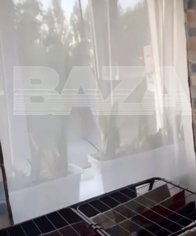 Exclusive Footage from Baza Telegram Reveals Drone Explosion Near Azov Residential Area