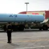 China's PLA Unveils Advanced Military Tech in Beijing Parade, General U Zhike Highlights 'Hypersonic Missiles, Drones, and Tanks' as Anniversary Commemoration Unfolds
